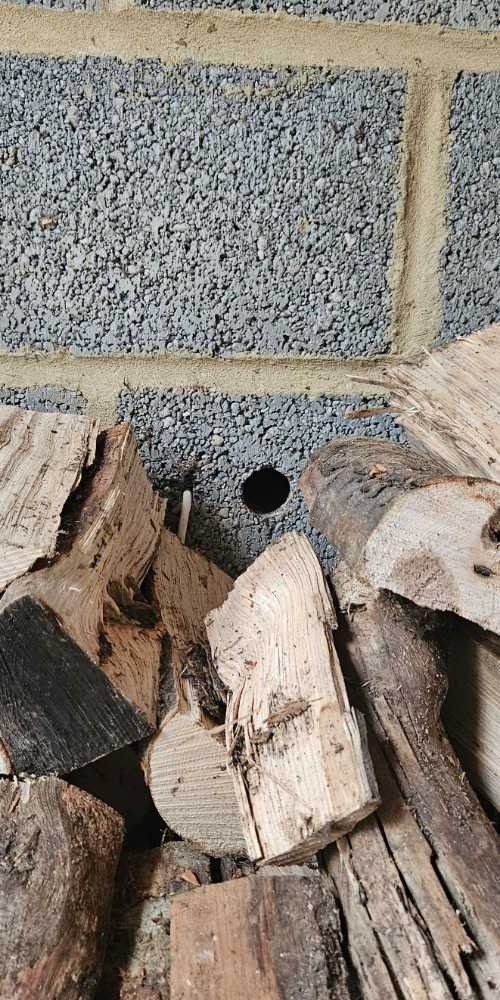 Small hole in brickwork